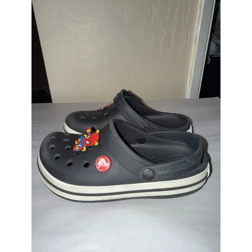 Crocs black youth size 12 with Spider-Man croc charms jibbits